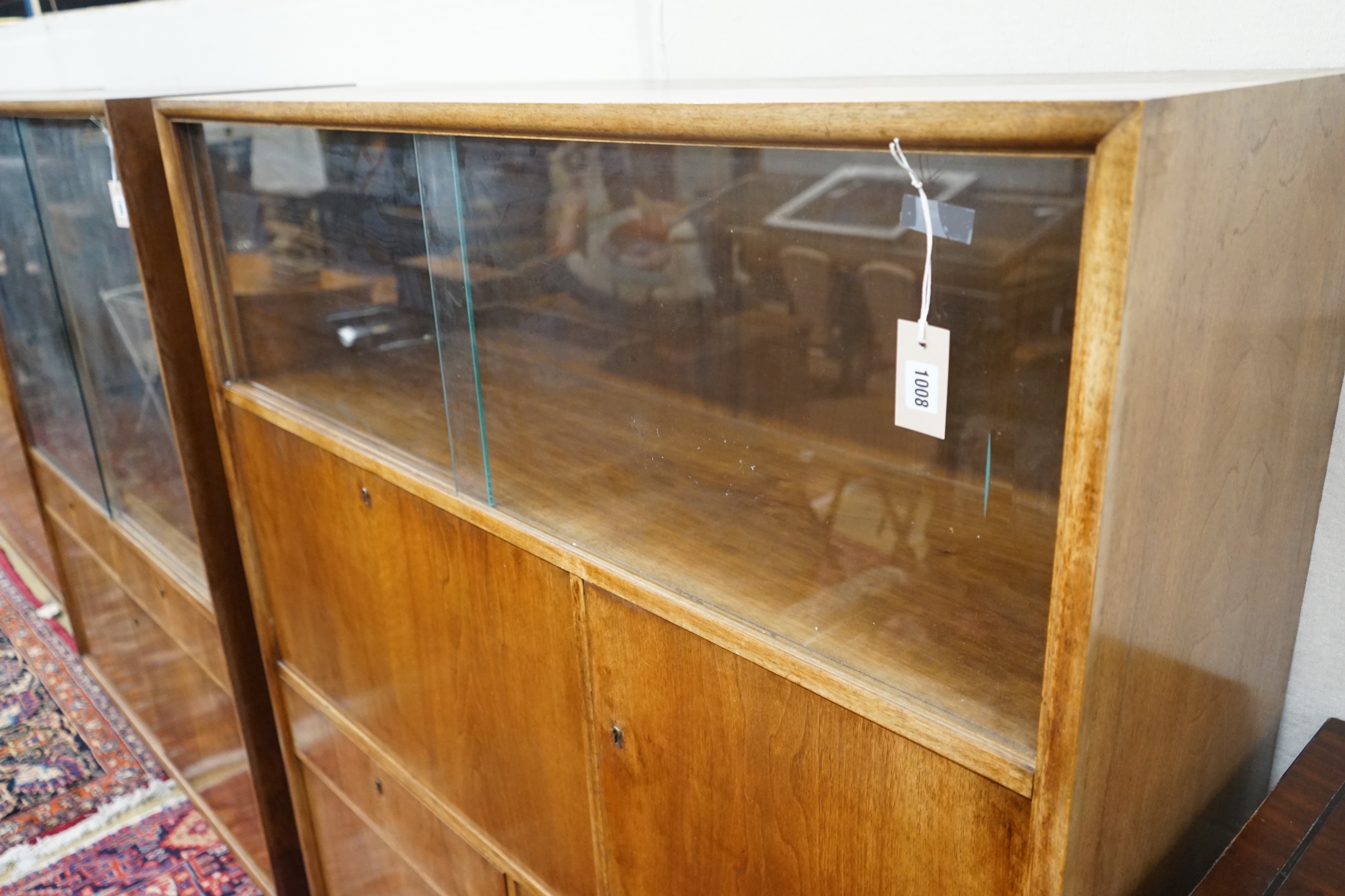 A mid century walnut writing cabinet by Georg Schoettle, Stuttgart, width 135cm, depth 40cm, height 160cm